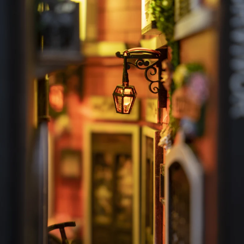 A beautiful book nook alleyway with tiny lights